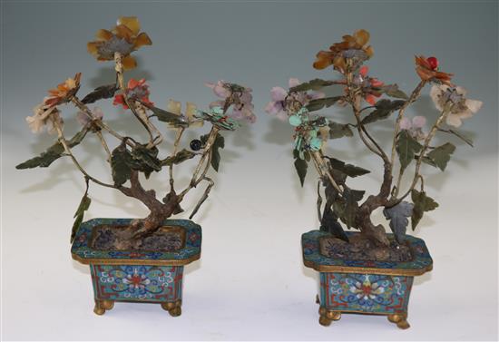 A pair of Chinese hardstone and coral mounted models of trees in cloisonné enamel jardinieres, early 20th century, 30cm, some losses